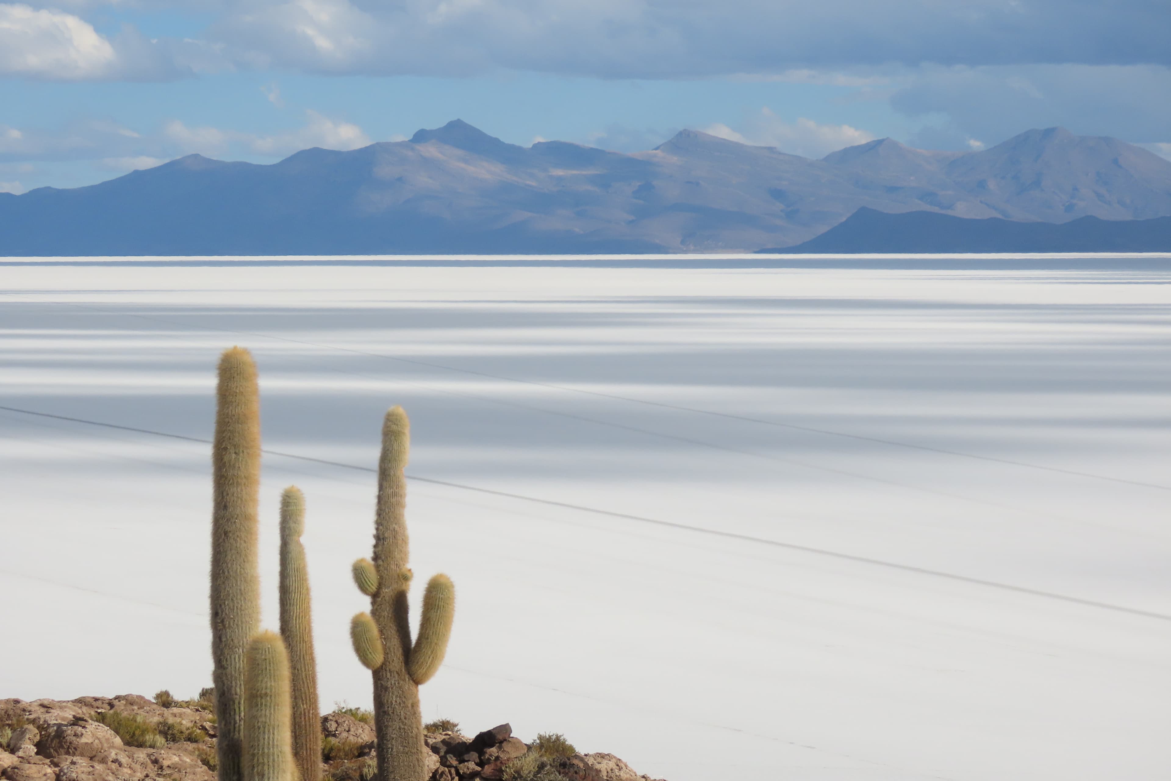 Step into a surreal dreamscape of endless white salt, stunning reflections, and breathtaking sunsets in Bolivia’s most iconic destination.