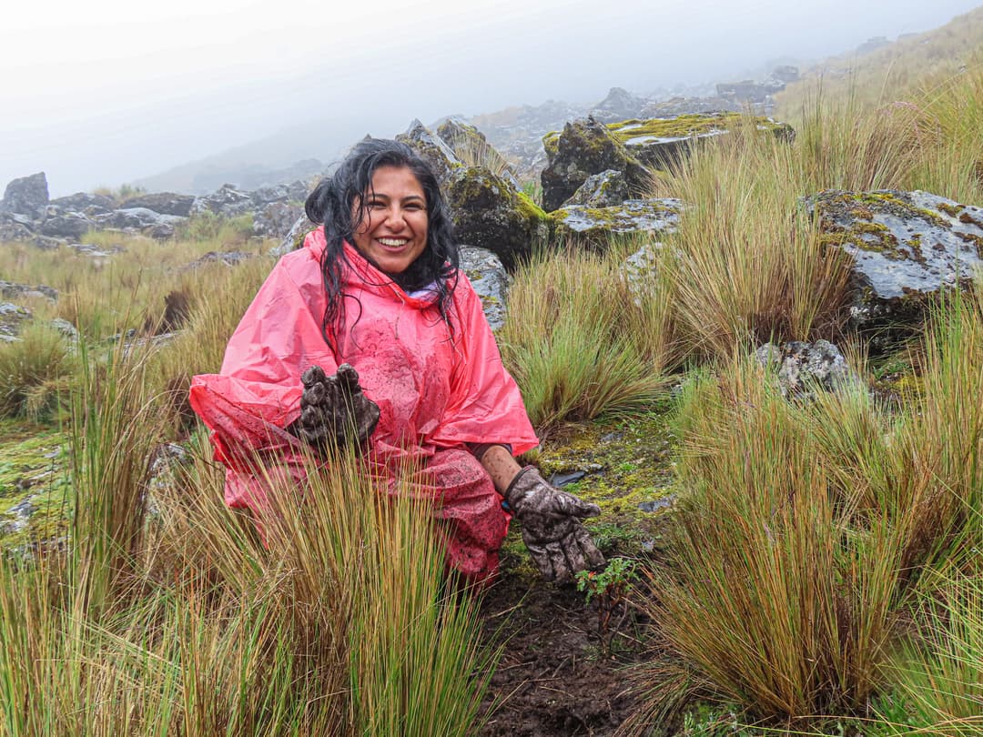 Image of a cheerful person on a hill.